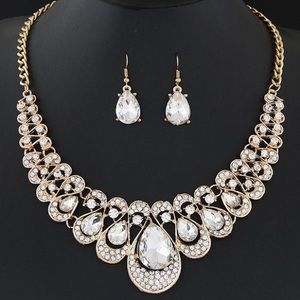 Clear gemstone metal collar necklace earrings set with diamonds